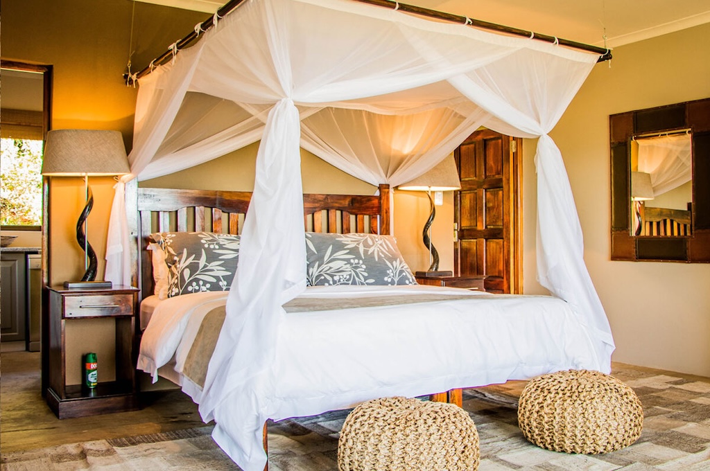 Deluxe Suites Himmelbett mit Moskitonetz in einer Deluxe-Suite