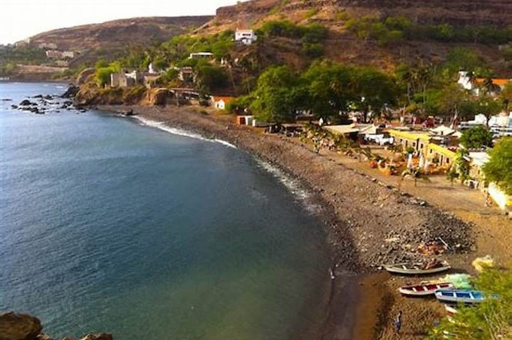 Palm-lined sandy beach in the north of Santiago, Cape Verde