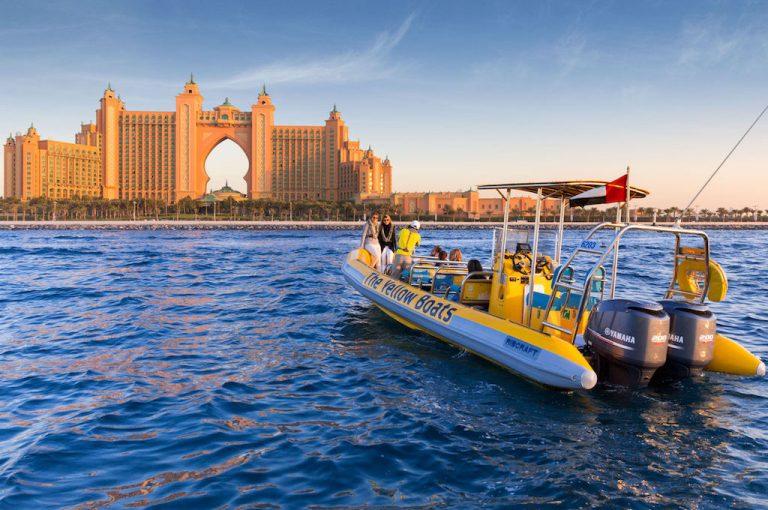 Yellow boat tour past the Atlantis hotel in Dubai