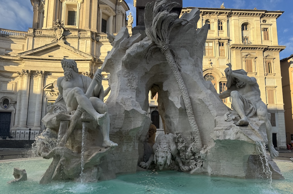 Piazza Navona lit up in the evening in Rome, Italy